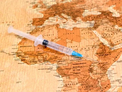 Kort over afrika og en sprøjte